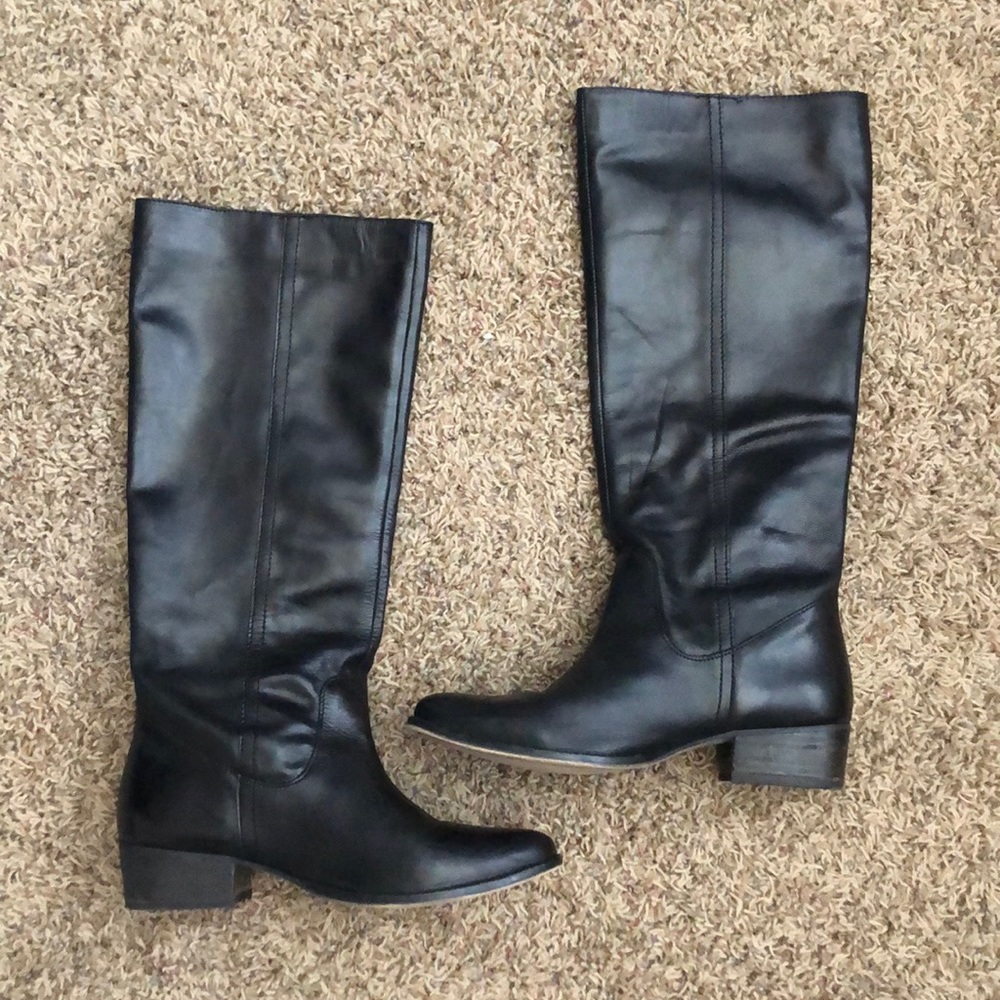 Knee high black leather Report Signature boots.